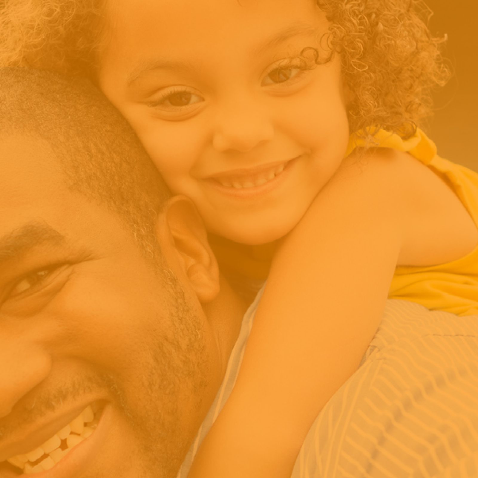 EmbraceRace website image of father giving daughter a piggyback ride